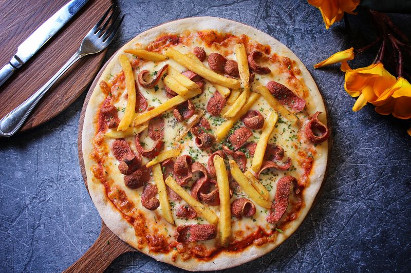 Margherita thin crust pizza Pequods